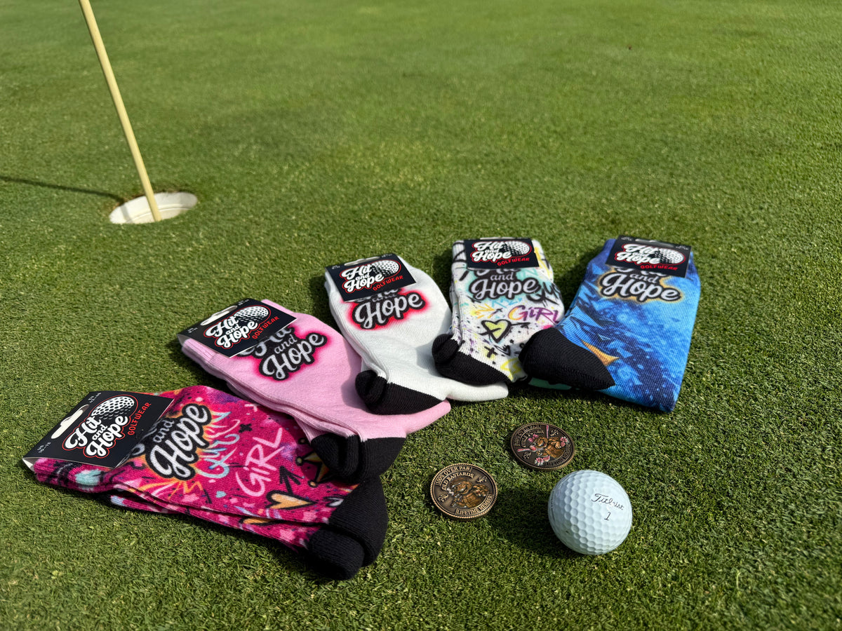 Golfer wearing colourful HIT AND HOPE socks on the course